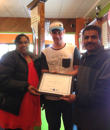 Franchisees Nag Mani, Binesh Naidu were presented with their three-year long service award by Tauranga Regional Manager Jan Lichtwark.