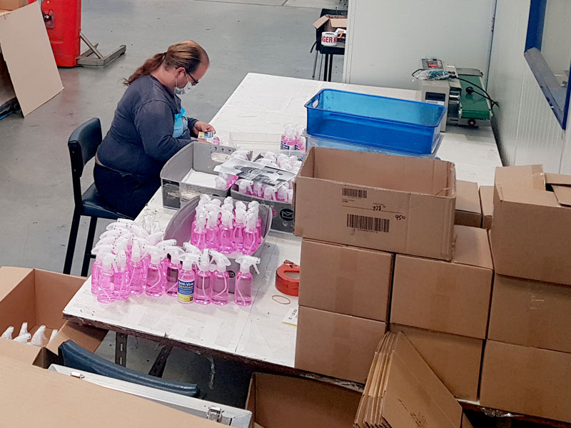 Bottles are labelled before boxed for dispatch.