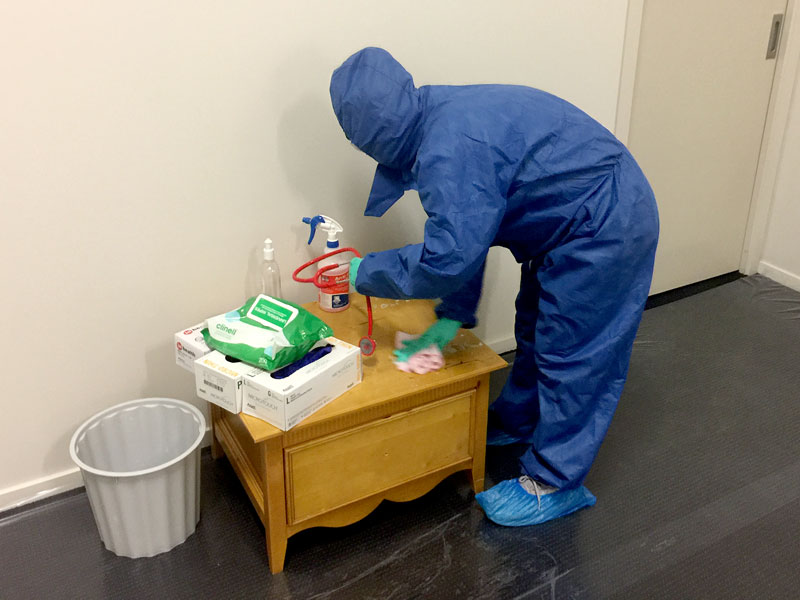 Marlene Madrid carries out sanitising.