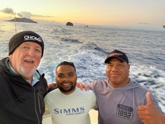 Darrel, Raj and Bura enjoy a day on the water together.