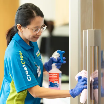 Sanitising service wiping down handles
