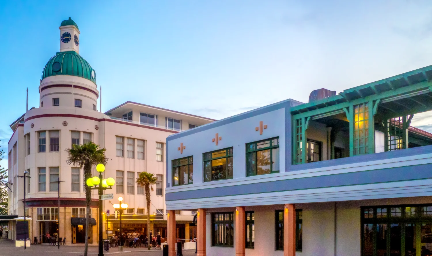Art Deco architecture in Napier, Hawke's Bay, featuring the iconic T&G Building at dusk—representing CrestClean’s commercial cleaning services in the region.
