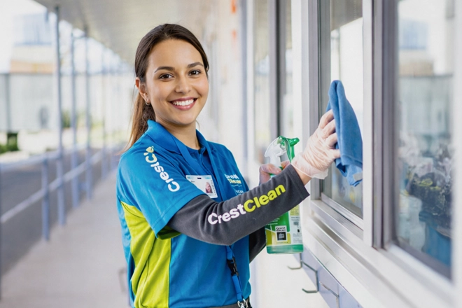 Women cleaning school windows